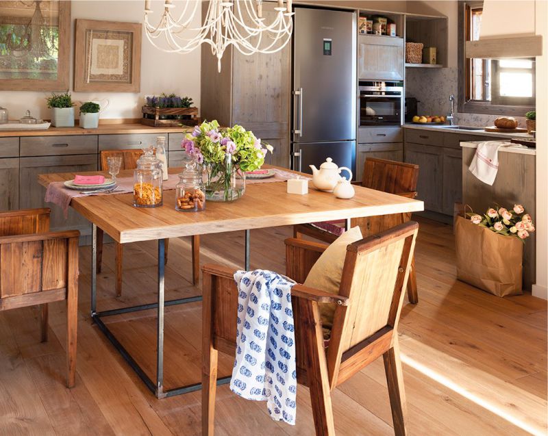 Wooden dining table in a beautiful kitchen