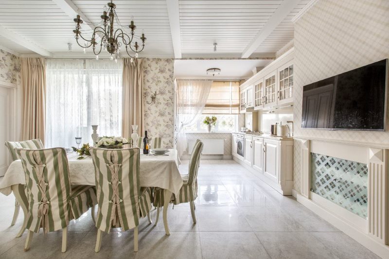 Light ceramic flooring in the interior of the kitchen-living room