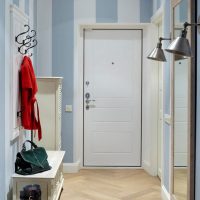 Light parquet in a small hallway