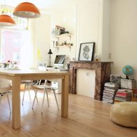 Orange lights above the dining table