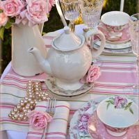 Teapot on a striped tablecloth