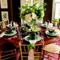 Bouquet with roses on a round table