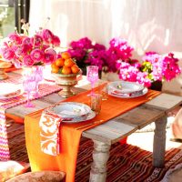 Orange tablecloth on an old table