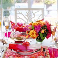 vase with fresh flowers on a table in the living room