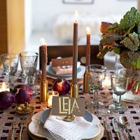 Brown candles on the festive table