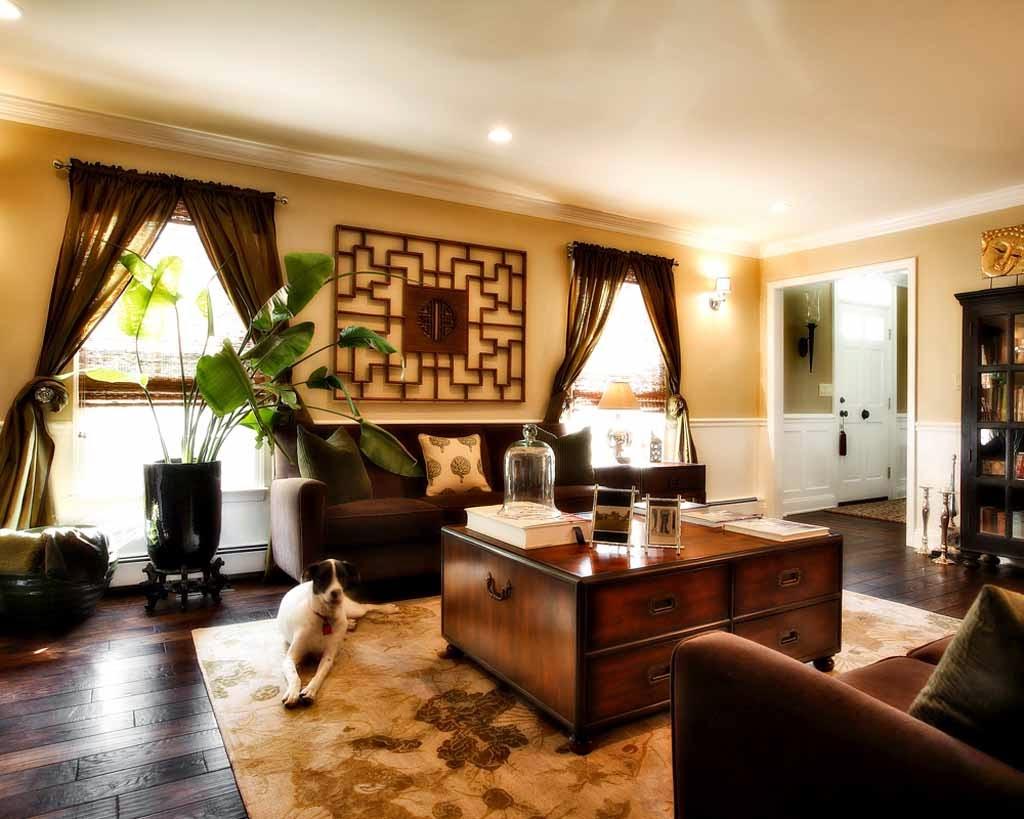 Light yellow walls in the living room with wooden furniture