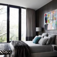 Gray wall in the interior of the bedroom