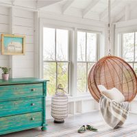 Hanging chair in the living room of a country house