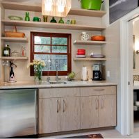 Open shelves around the kitchen window