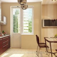 Linear kitchen with a balcony in a panel house