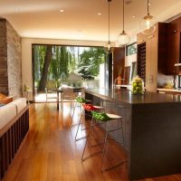 Wooden floor in the spacious kitchen-living room