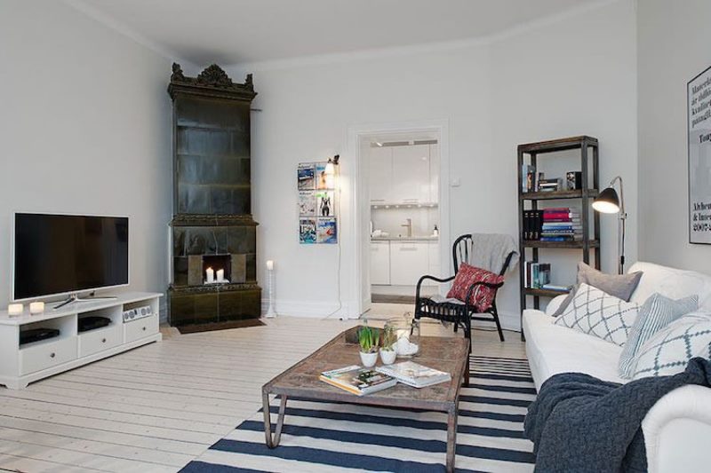 Fireplace in the corner of the living room of a country house