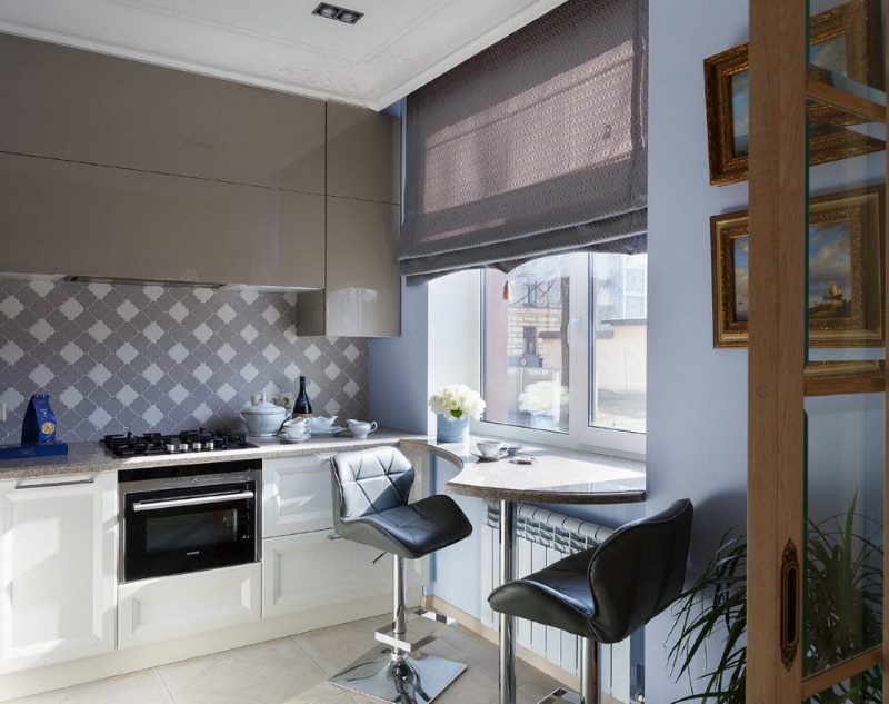 Gray hanging cabinets in the kitchen with roman blinds