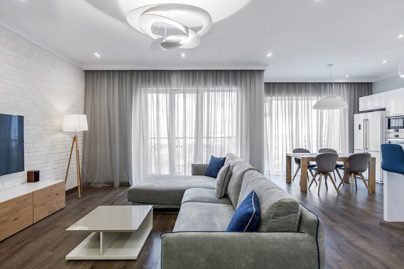 Kitchen-living room design in gray shades