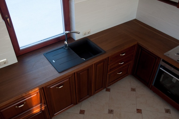 Kitchen with oak countertops.