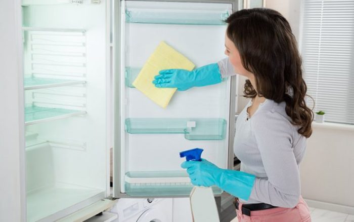 Washing a new refrigerator.