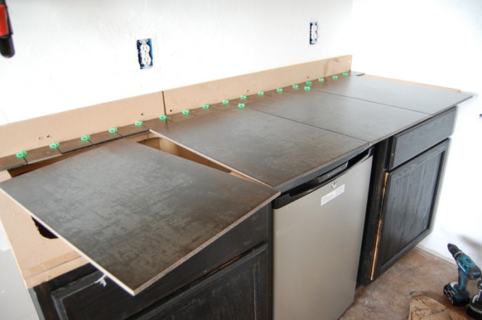 Installation of granite countertops.