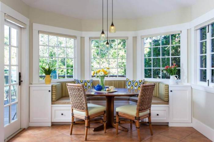 Sofa in bay window kitchen.