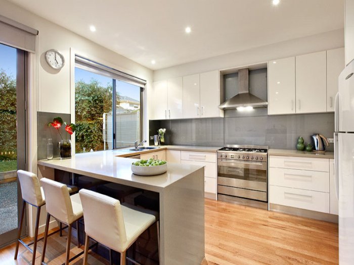 The height of the kitchen worktop.