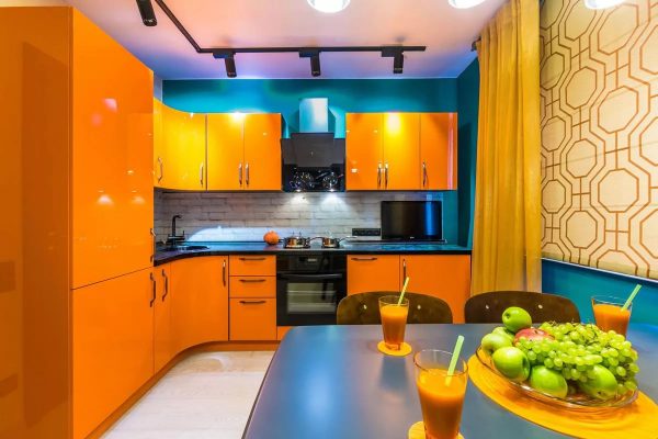 Combinations with peach come out appetizing enough, which is very characteristic of the kitchen space.